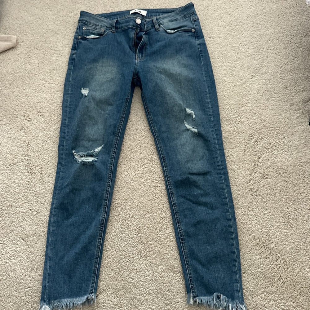 Women's Distressed Blue Jeans